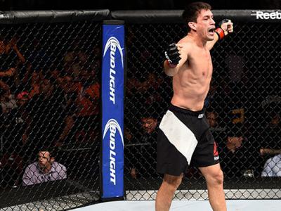 VANCOUVER, BC - AUGUST 27: (R-L) Demian Maia of Brazil celebrates his submission victory over Carlos Condit of the United States in their welterweight bout during the UFC Fight Night event at Rogers Arena on August 27, 2016 in Vancouver, British Columbia,