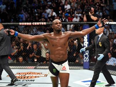 ANAHEIM, CA - JULY 29:  Jon Jones celebrates after knocking out Daniel Cormier in their UFC light heavyweight championship bout during the UFC 214 event at Honda Center on July 29, 2017 in Anaheim, California.  (Photo by Josh Hedges/Zuffa LLC/Zuffa LLC vi