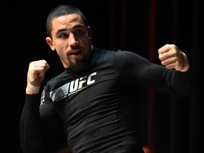CHICAGO, ILLINOIS - JUNE 06:   Robert Whittaker of New Zealand works out for fans and media during the UFC 225 Open Workouts at the Chicago Theatre on June 6, 2018 in Chicago, Illinois. (Photo by Josh Hedges/Zuffa LLC/Zuffa LLC via Getty Images)