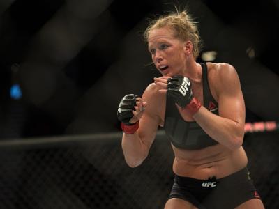 LAS VEGAS, NV - MARCH 5:   (R-L) Holly Holm circles Miesha Tate during their women's bantamweight championship  bout during the UFC 196 in the MGM Grand Garden Arena on March 5, 2016 in Las Vegas, Nevada. (Photo by Brandon Magnus/Zuffa LLC/Zuffa LLC via G