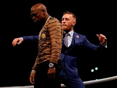 LONDON, ENGLAND - JULY 14:  (R-L) Conor McGregor taunts Floyd Mayweather Jr. during the Floyd Mayweather Jr. v Conor McGregor World Press Tour event at SSE Arena on July 14, 2017 in London, England. (Photo by Jeff Bottari/Zuffa LLC/Zuffa LLC via Getty Ima