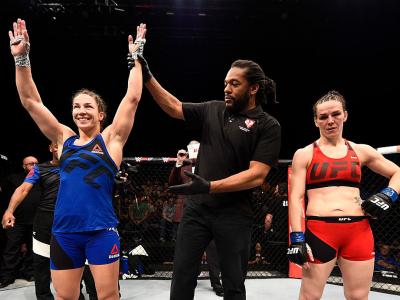 LAS VEGAS, NV - DECEMBER 03: Sara McMann celebrates after her submission victory over Alexis Davis of Canada during The Ultimate Fighter Finale event inside the Pearl concert theater at the Palms Resort & Casino on December 3, 2016 in Las Vegas, Nevada. (