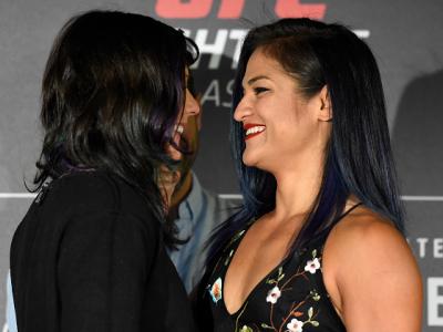 GLASGOW, SCOTLAND - JULY 13:  (L-R) Opponents Joanne Calderwood of Scotland and Cynthia Calvillo face off during the UFC Ultimate Media Day at the Crowne Plaza Glasgow on July 13, 2017 in Glasgow, Scotland. (Photo by Josh Hedges/Zuffa LLC/Zuffa LLC via Ge
