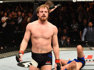 LONDON, ENGLAND - MARCH 18:  (L-R)Gunnar Nelson of Iceland celebrates his submission victory over Alan Jouban of the United States in their welterweight fight during the UFC Fight Night event at The O2 arena on March 18, 2017 in London, England. (Photo by