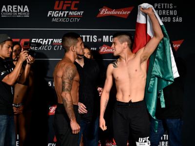 MEXICO CITY, MEXICO - AUGUST 04:  (L-R) Sergio Pettis of the United States and Brandon Moreno of Mexico face off during the UFC Fight Night weigh-in inside the W Hotel on August 4, 2017 in Mexico City, Mexico. (Photo by Jeff Bottari/Zuffa LLC/Zuffa LLC vi
