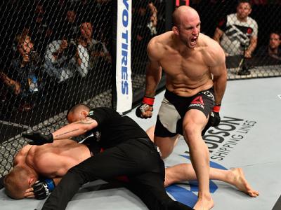 STOCKHOLM, SWEDEN - MAY 28:  (R-L) Volkan Oezdemir celebrates his knockout victory over Misha Cirkunov in their light heavyweight fight during the UFC Fight Night event at the Ericsson Globe Arena on May 28, 2017 in Stockholm, Sweden. (Photo by Jeff Botta