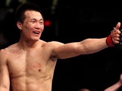 FAIRFAX, VA - MAY 15:  "The Korean Zombie" Chan Sung Jung reacts after defeating Dustin Poirier in a featherweight bout during the UFC on Fuel TV event at Patriot Center on May 15, 2012 in Fairfax, Virginia.  (Photo by Josh Hedges/Zuffa LLC/Zuffa LLC via 