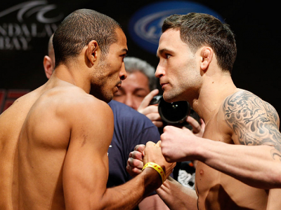 LAS VEGAS, NV - FEBRUARY 01:  (L-R) Opponents Jose Aldo and Frankie Edgar face off during the UFC 156 weigh-in on February 1, 2013 at Mandalay Bay Events Center in Las Vegas, Nevada.  (Photo by Josh Hedges/Zuffa LLC/Zuffa LLC via Getty Images)
