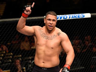 CHICAGO, IL - JULY 23:  Luis Henrique of Brazil celebrates after defeating Dmitry Smolyakov of Russia by submission in their heavyweight bout during the UFC Fight Night event at the United Center on July 23, 2016 in Chicago, Illinois. (Photo by Josh Hedge