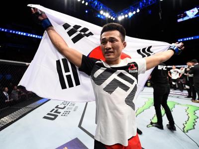 HOUSTON, TX - FEBRUARY 04:  Chan Sung Jung of South Korea celebrates his victory over Dennis Bermudez in their featherweight bout during the UFC Fight Night event at the Toyota Center on February 4, 2017 in Houston, Texas. (Photo by Jeff Bottari/Zuffa LLC