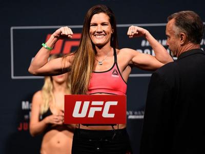 SIOUX FALLS, SD - JULY 12:   Cortney Casey steps onto the scale during the UFC Fight Night weigh-in at Denny Sanford Premier Center on July 12, 2016 in Sioux Falls, South Dakota. (Photo by Jeff Bottari/Zuffa LLC/Zuffa LLC via Getty Images)
