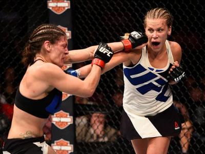 SIOUX FALLS, SD - JULY 13:   (R-L) Katlyn Chookagian punches Lauren Murphy in their women's bantamweight bout during the UFC Fight Night event on July 13, 2016 at Denny Sanford Premier Center in Sioux Falls, South Dakota. (Photo by Jeff Bottari/Zuffa LLC/