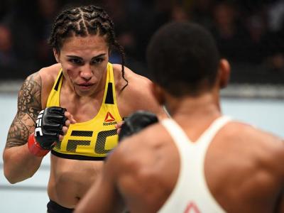 HOUSTON, TX - FEBRUARY 04:  (L-R) Jessica Andrade of Brazil circles Angela Hill in their women's strawweight bout during the UFC Fight Night event at the Toyota Center on February 4, 2017 in Houston, Texas. (Photo by Jeff Bottari/Zuffa LLC/Zuffa LLC via G