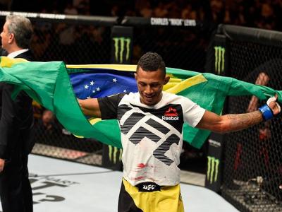 MANCHESTER, ENGLAND - OCTOBER 08:  Iuri Alcantara of Brazil celebrates his submission victory over Brad Pickett of England in their bantamweight bout during the UFC 204 Fight Night at the Manchester Evening News Arena on October 8, 2016 in Manchester, Eng