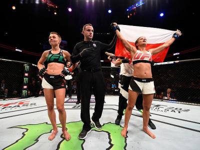 ATLANTA, GA - JULY 30:  (R-L) Karolina Kowalkiewicz celebrates her victory over Rose Namajunas in their women's strawweight bout during the UFC 201 event on July 30, 2016 at Philips Arena in Atlanta, Georgia. (Photo by Jeff Bottari/Zuffa LLC/Zuffa LLC via