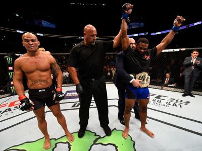 ATLANTA, GA - JULY 30:  (R-L)Tyron Woodley celebrates his knockout victory over Robbie Lawler in their welterweight championship bout during the UFC 201 event on July 30, 2016 at Philips Arena in Atlanta, Georgia. (Photo by Jeff Bottari/Zuffa LLC/Zuffa LL