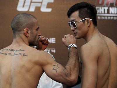 SINGAPORE - JANUARY 03:  (L and R) Tarec Saffiedine and Lim Hyun Gyu face off during the UFC Fight Night Singapore Weigh-in at the Shoppes at Marina Bay Sands on January 3, 2014 in Singapore. (Photo by Mitch Viquez/Zuffa LLC/Zuffa LLC via Getty Images)