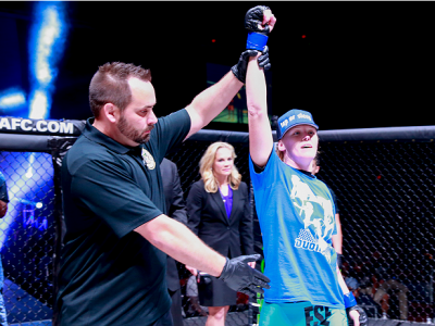 Tonya Evinger is announced as winner of her bout against Ediane Gomez at Invicta FC 8. (Photo by Ester Lin/Zuffa LLC/Zuffa LLC via Getty Images)